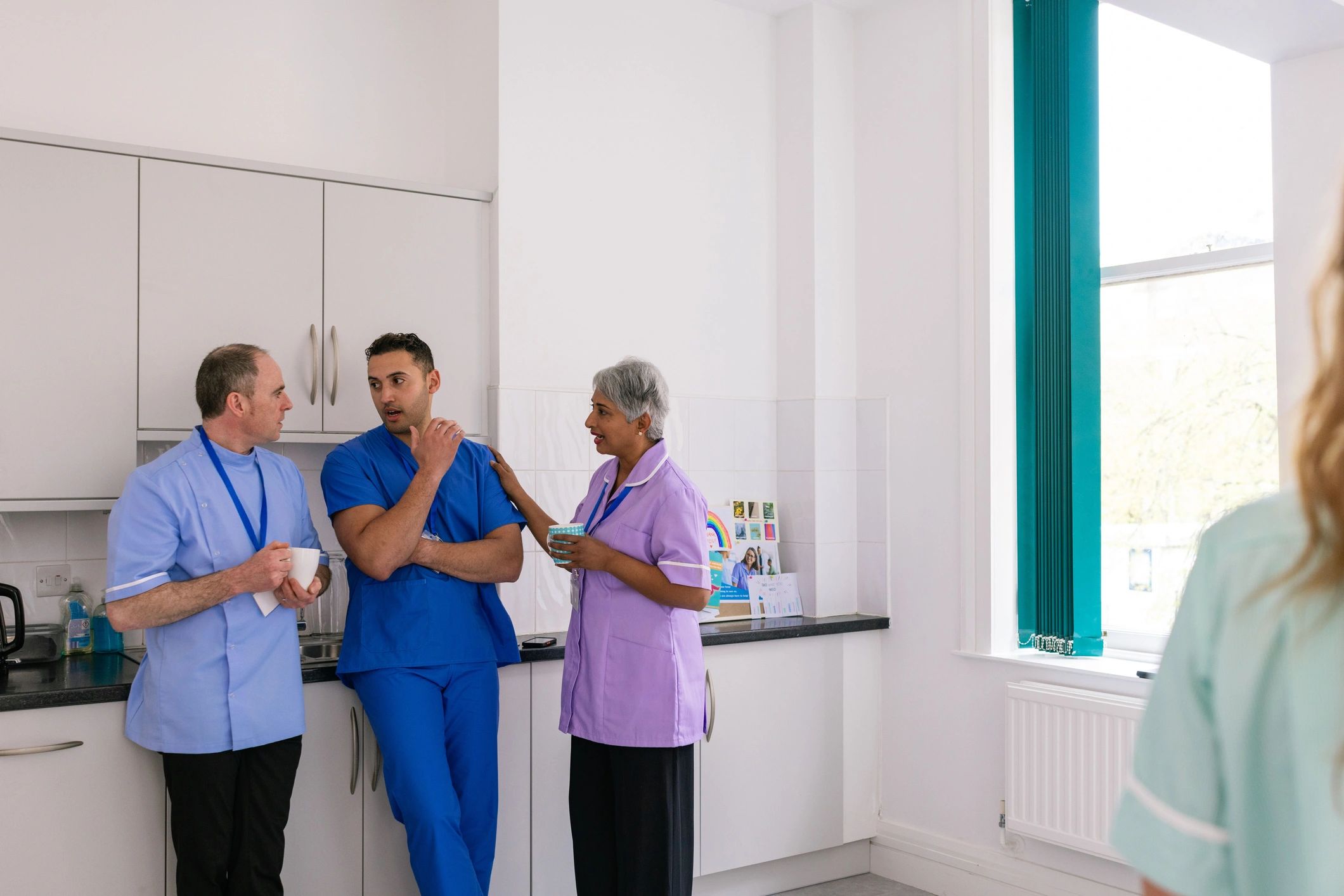 Healthcare team collaborating in a clinical setting
